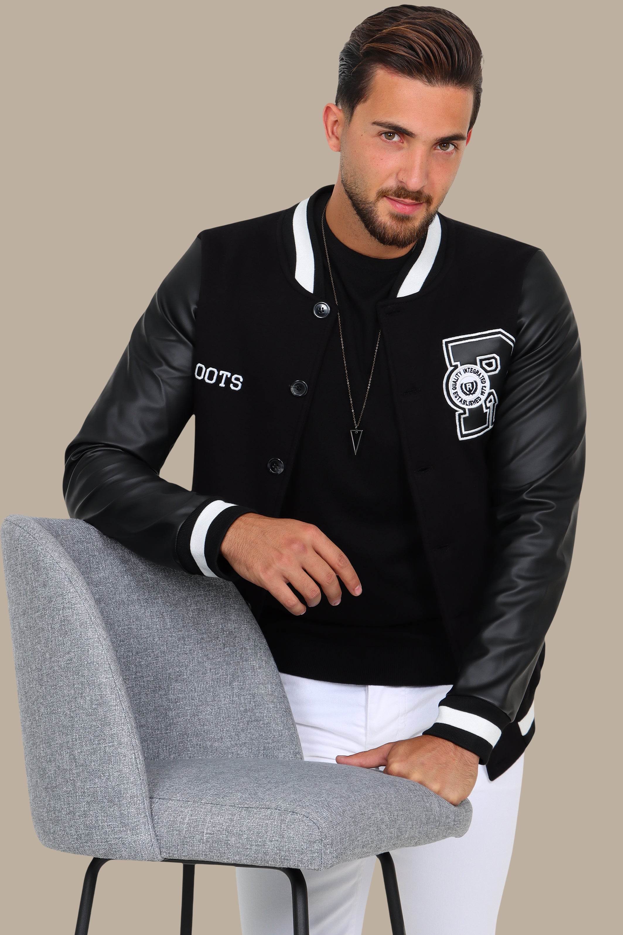 Black Patched Bomber Jacket: Classic Cool with a Stylish Edge