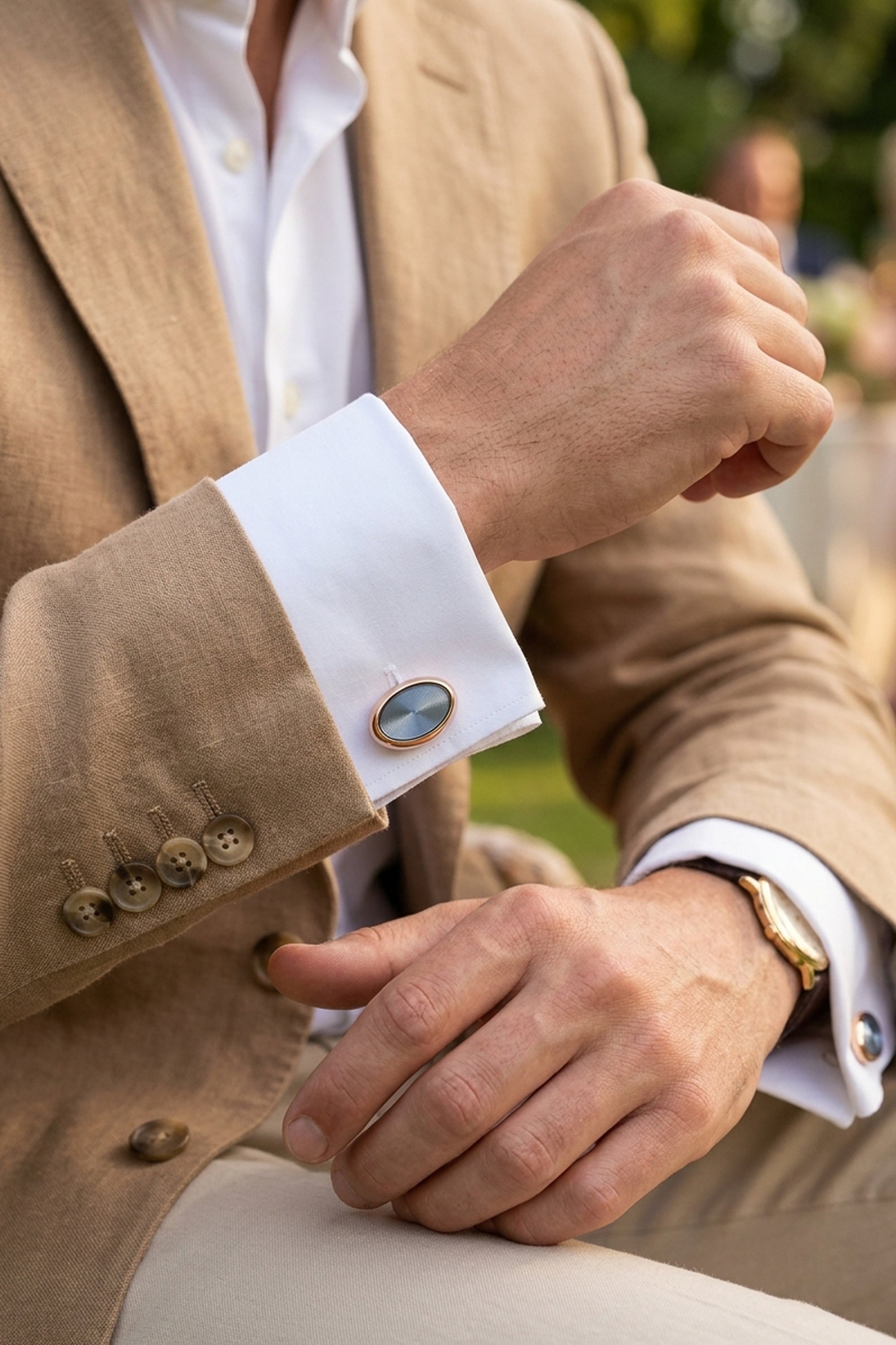 Gold Oval Cufflinks with Blue Stone