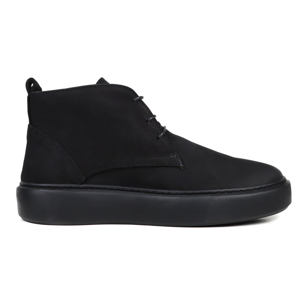 Black nubuck half boot with lace-up front and thick rubber sole.