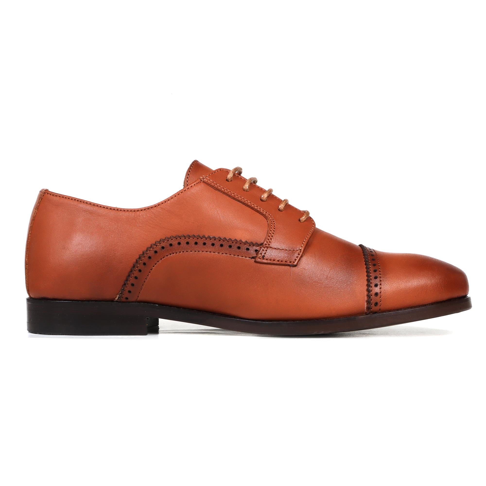 Tan leather Oxford shoe with cap toe and brogue detailing, black sole, and tan laces.
