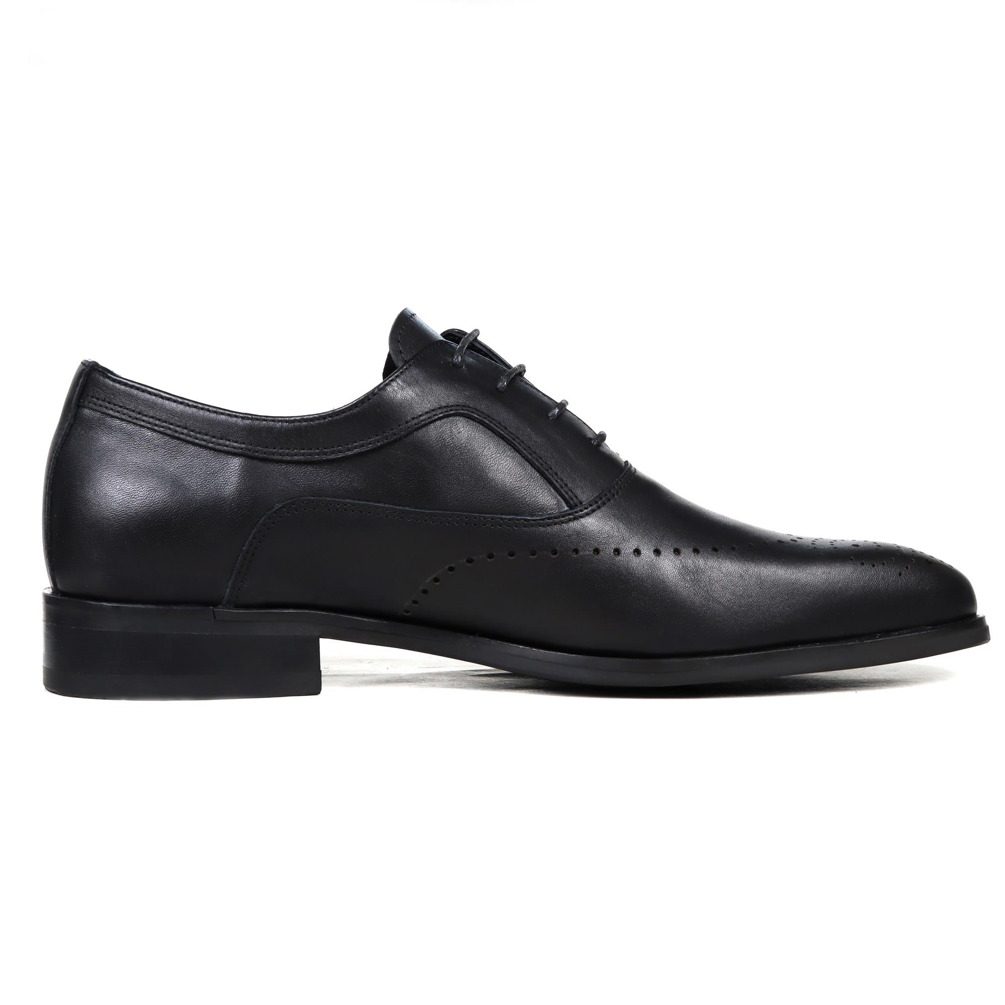 Black leather classic English oxford shoe with brogue detailing and closed lacing system.