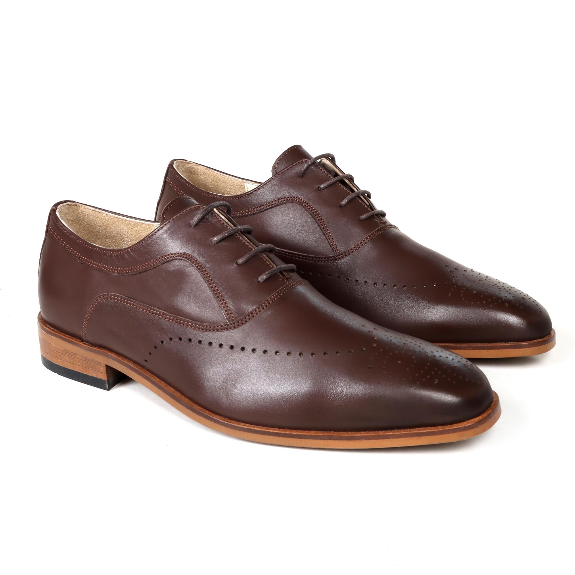 Brown leather English classic oxford shoes with brogue detailing and tan sole.