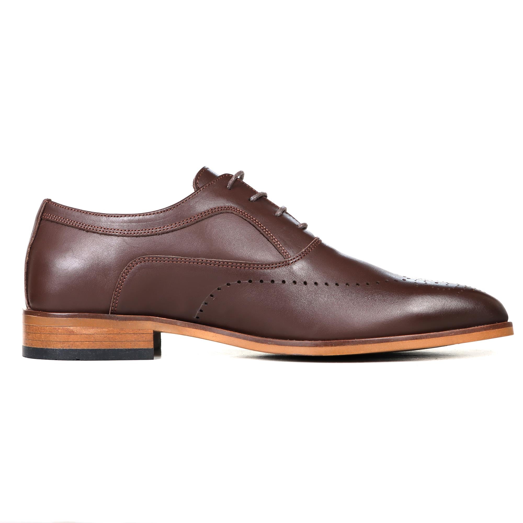 Brown leather English classic oxford shoes with brogue detailing and wooden sole.