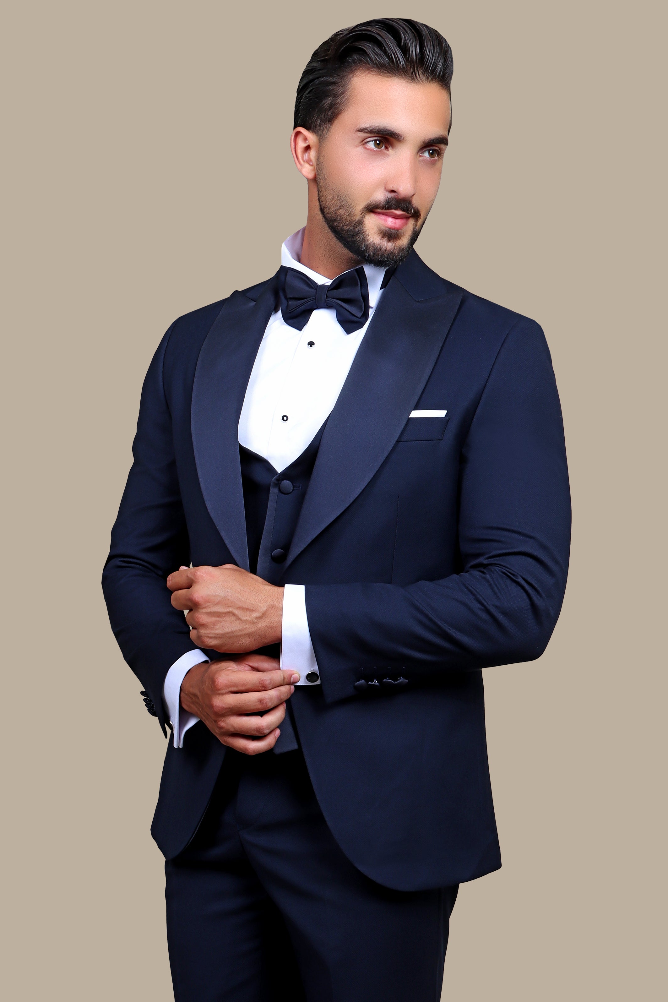 Navy Sophistication: 4-Piece Tuxedo Set with Peak Lapels