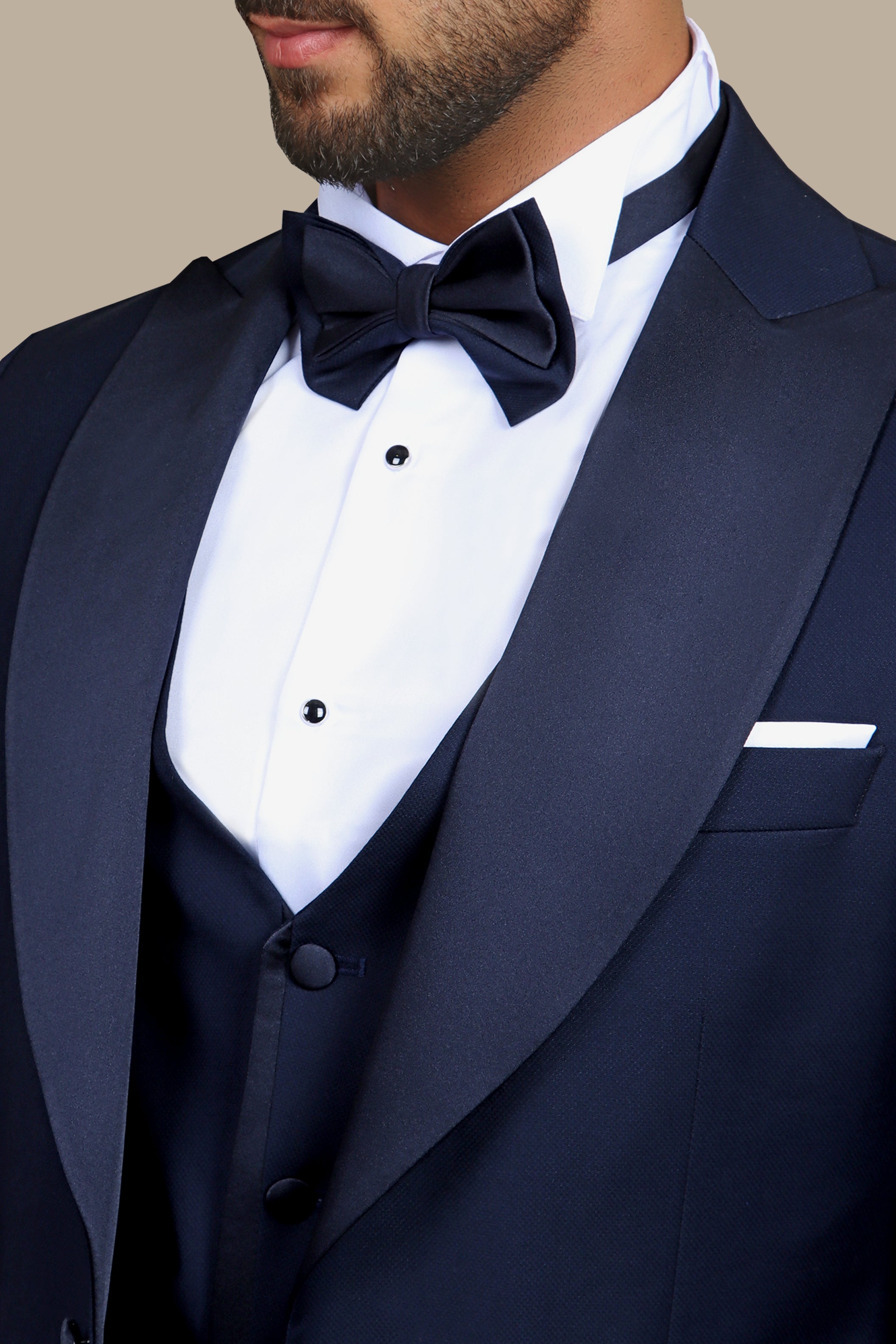 Navy Sophistication: 4-Piece Tuxedo Set with Peak Lapels