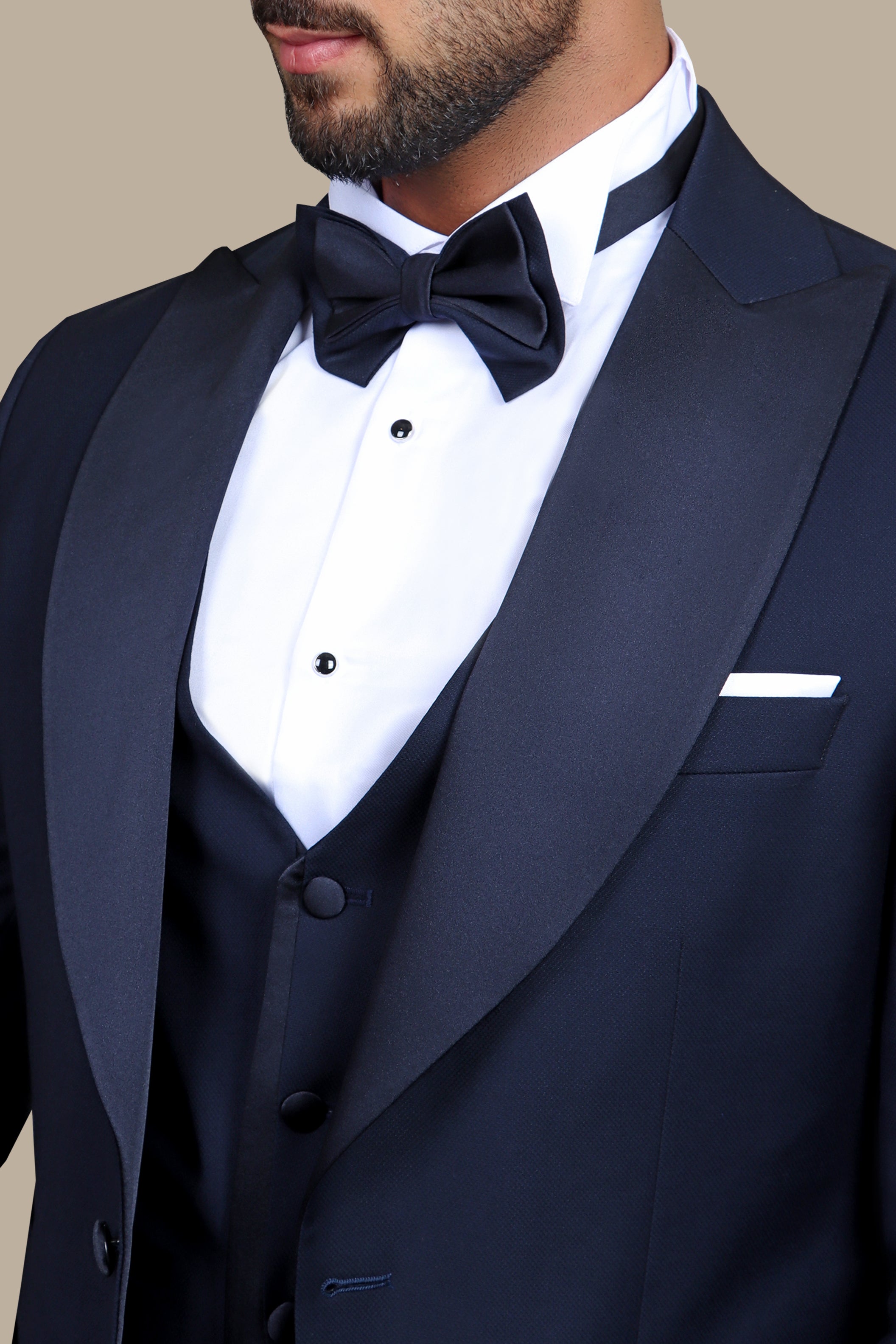 Navy Sophistication: 4-Piece Tuxedo Set with Peak Lapels