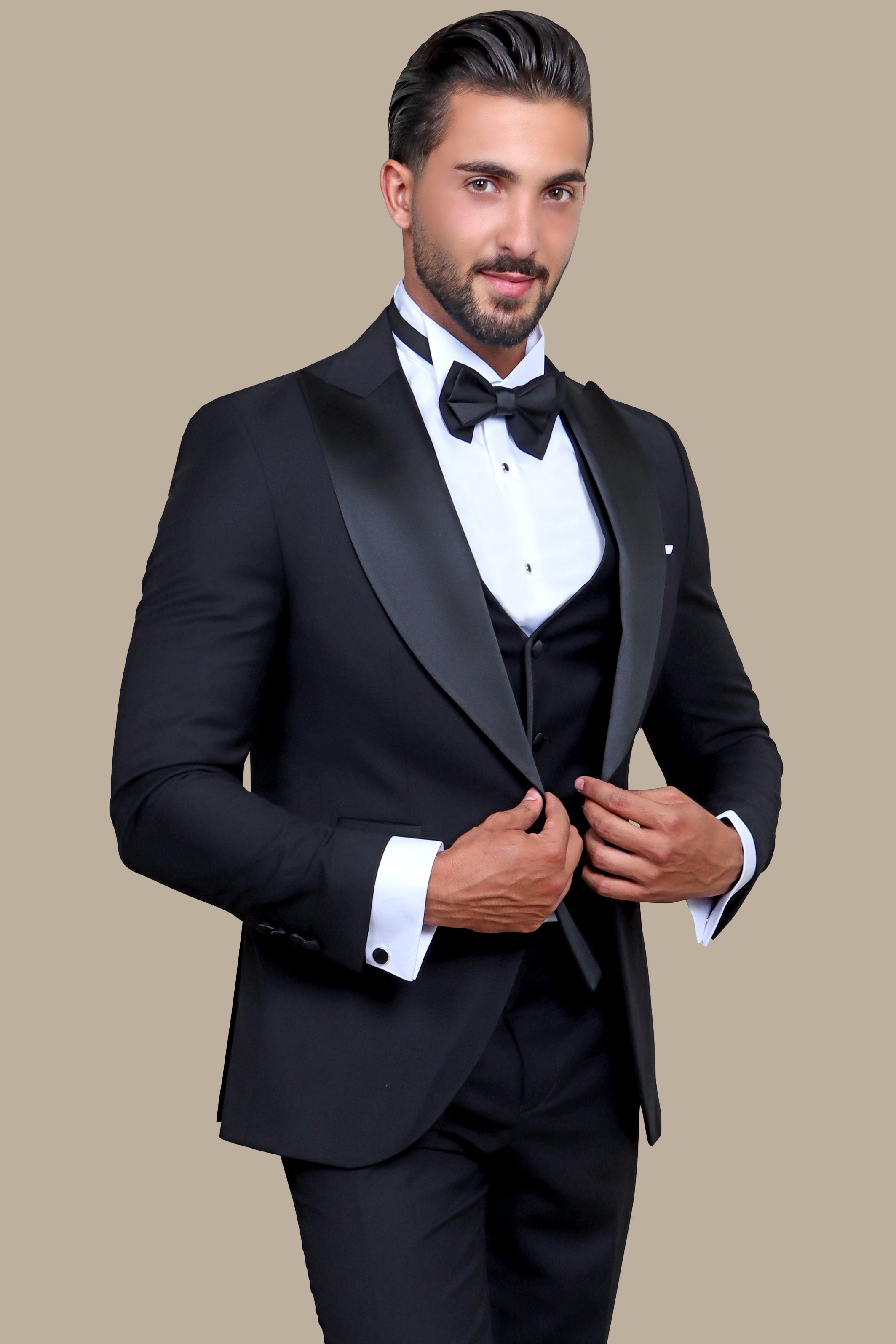 Peak of Elegance: Black 4-Piece Tuxedo Set with Peak Lapels