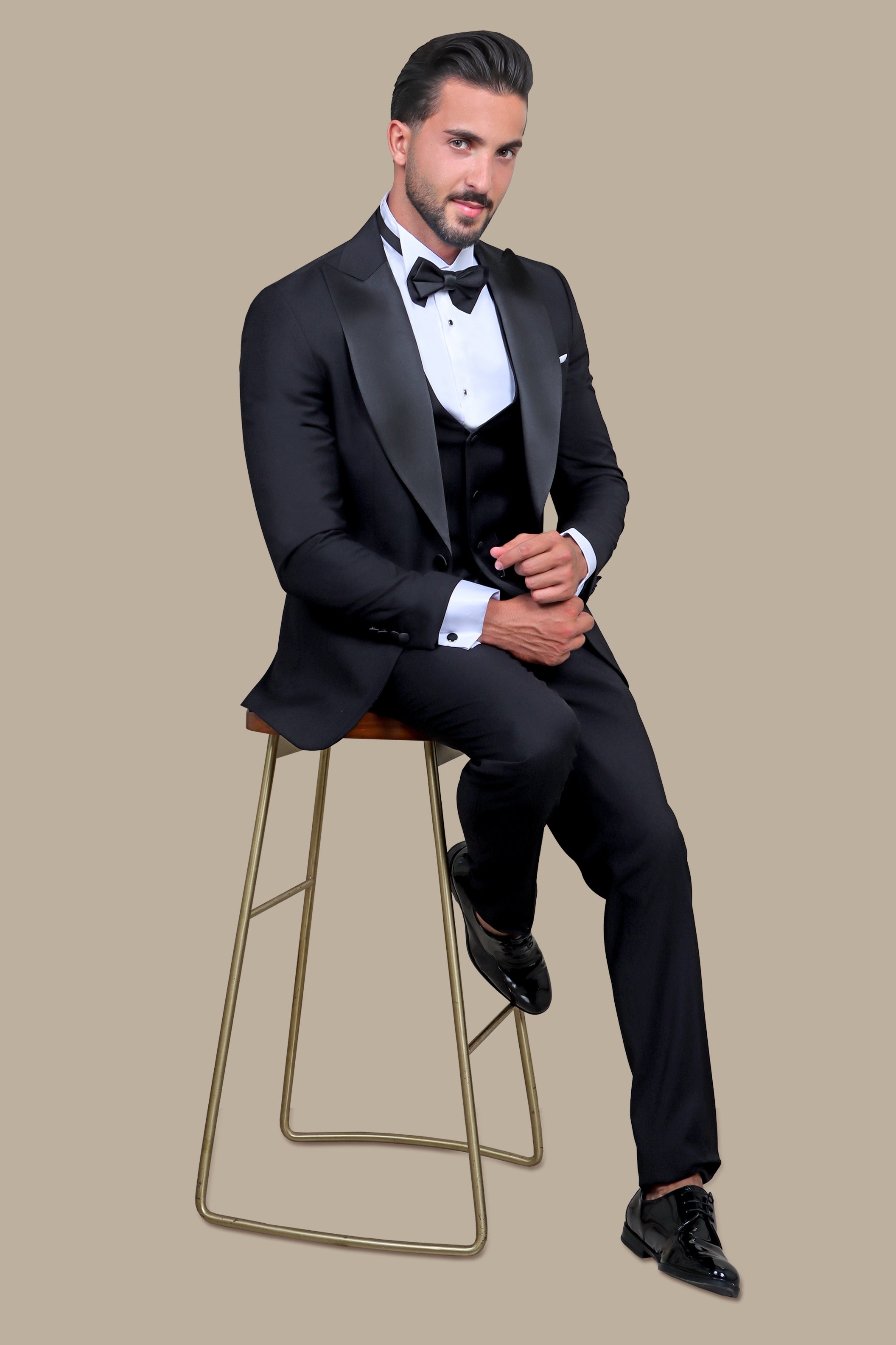 Peak of Elegance: Black 4-Piece Tuxedo Set with Peak Lapels