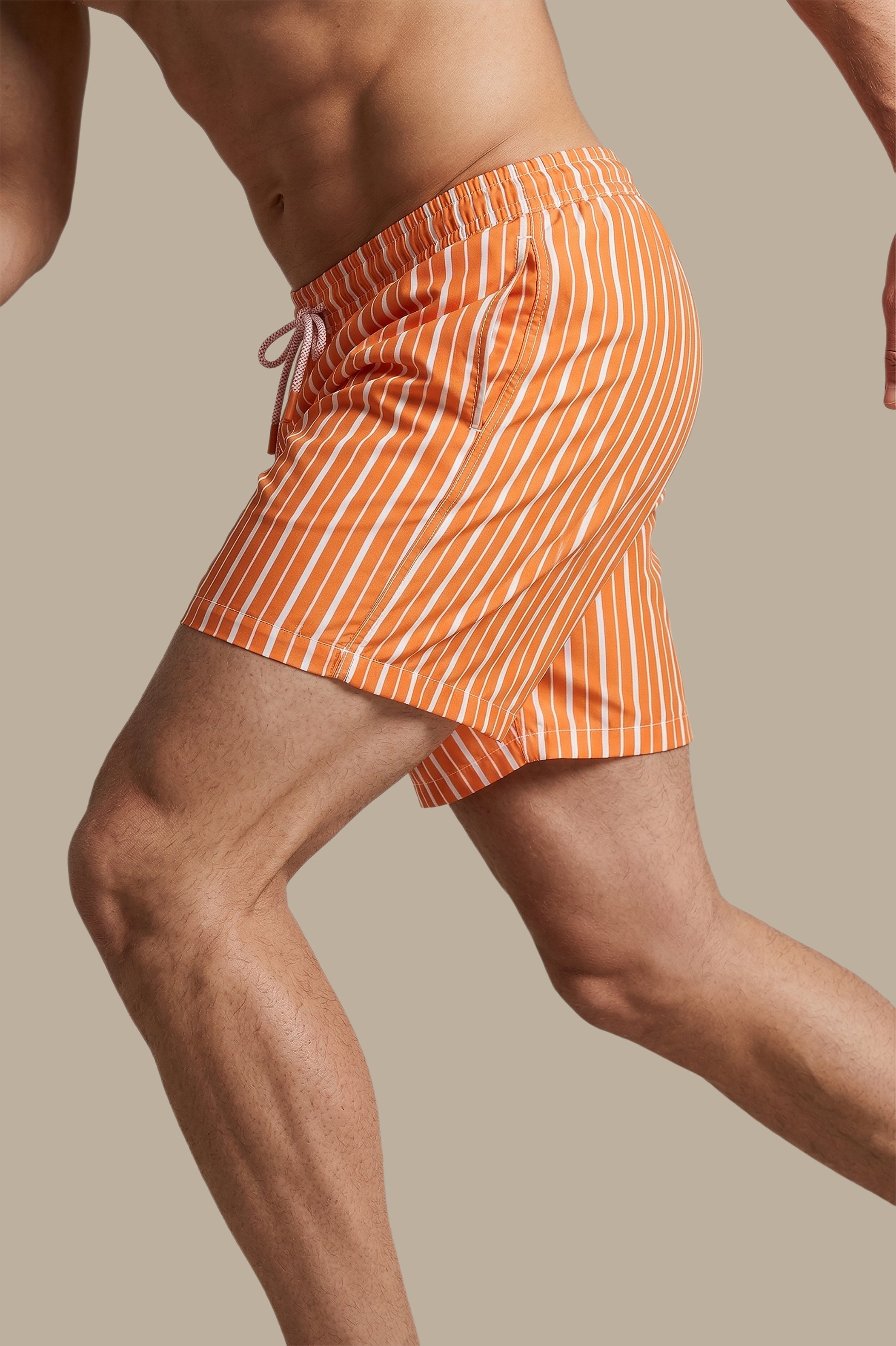 Sunset Stripes: Orange Striped Swimwear
