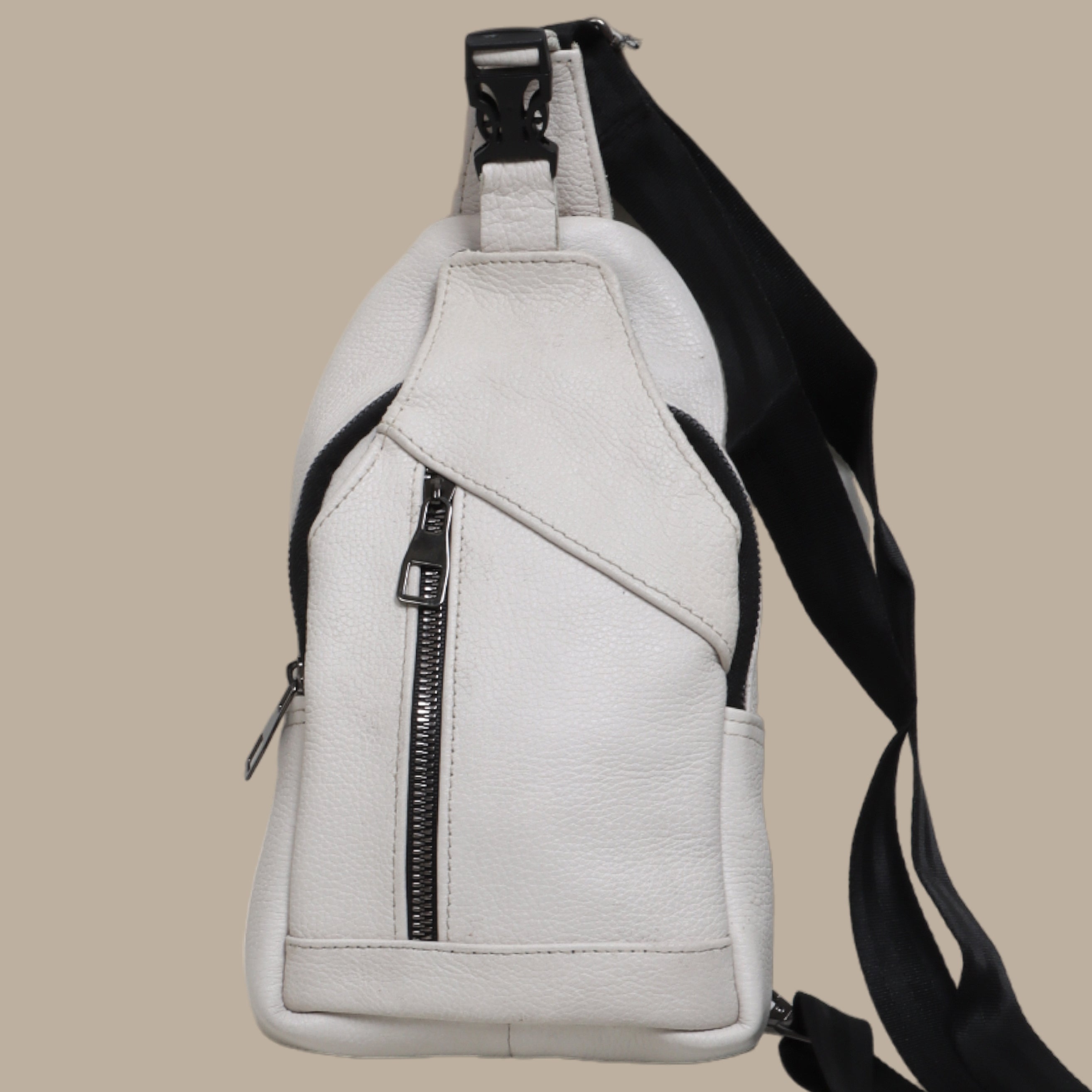 Timeless White Leather Crossbody Bag with Curved Elegance