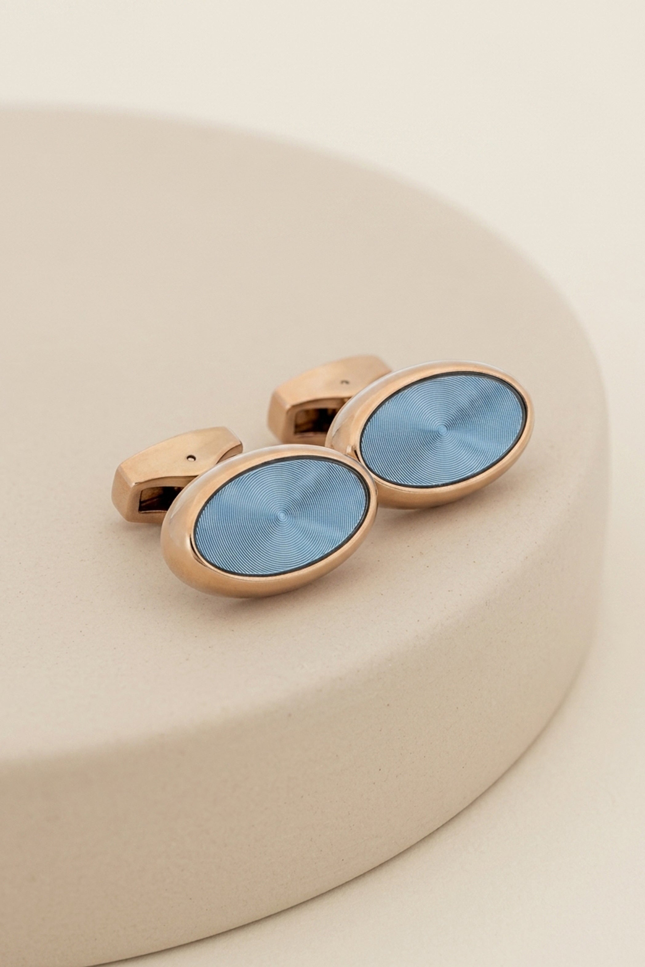 Gold Oval Cufflinks with Blue Stone