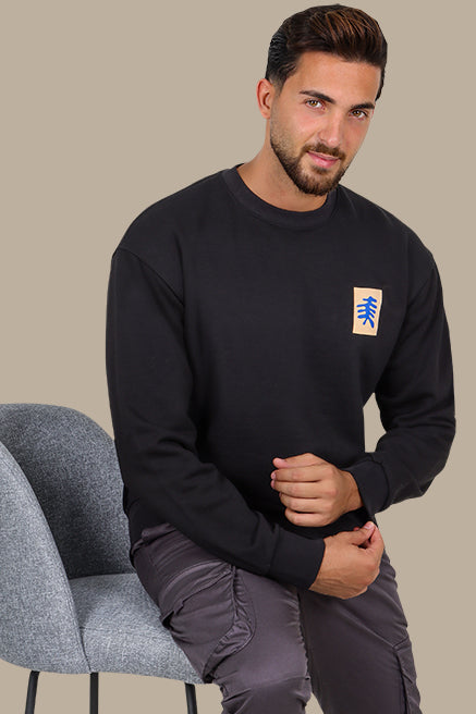 Expressive Edge: Black Sweatshirt with Back Face Print