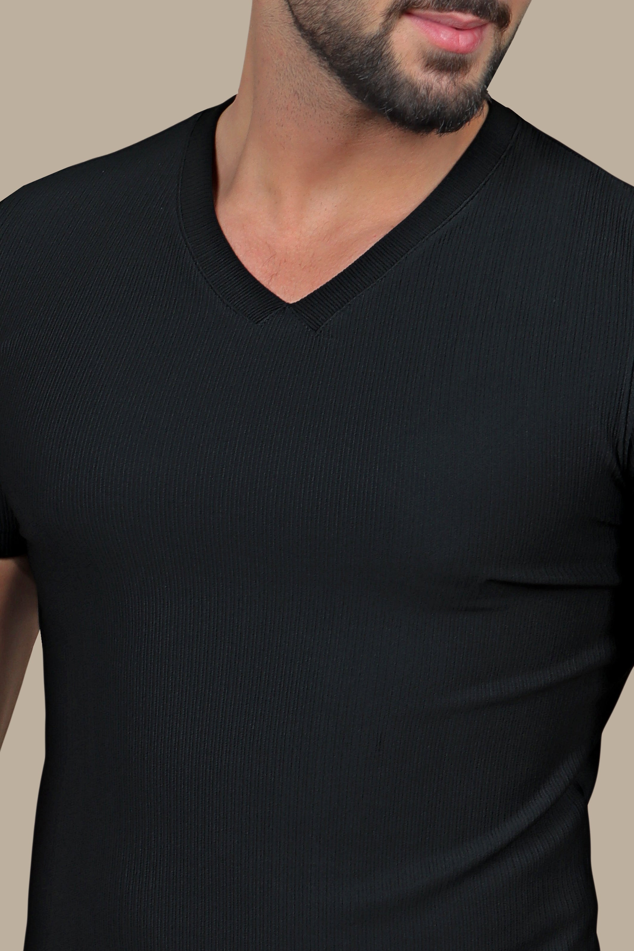 Urban Edge: The Ripped Black V-neck T-Shirt