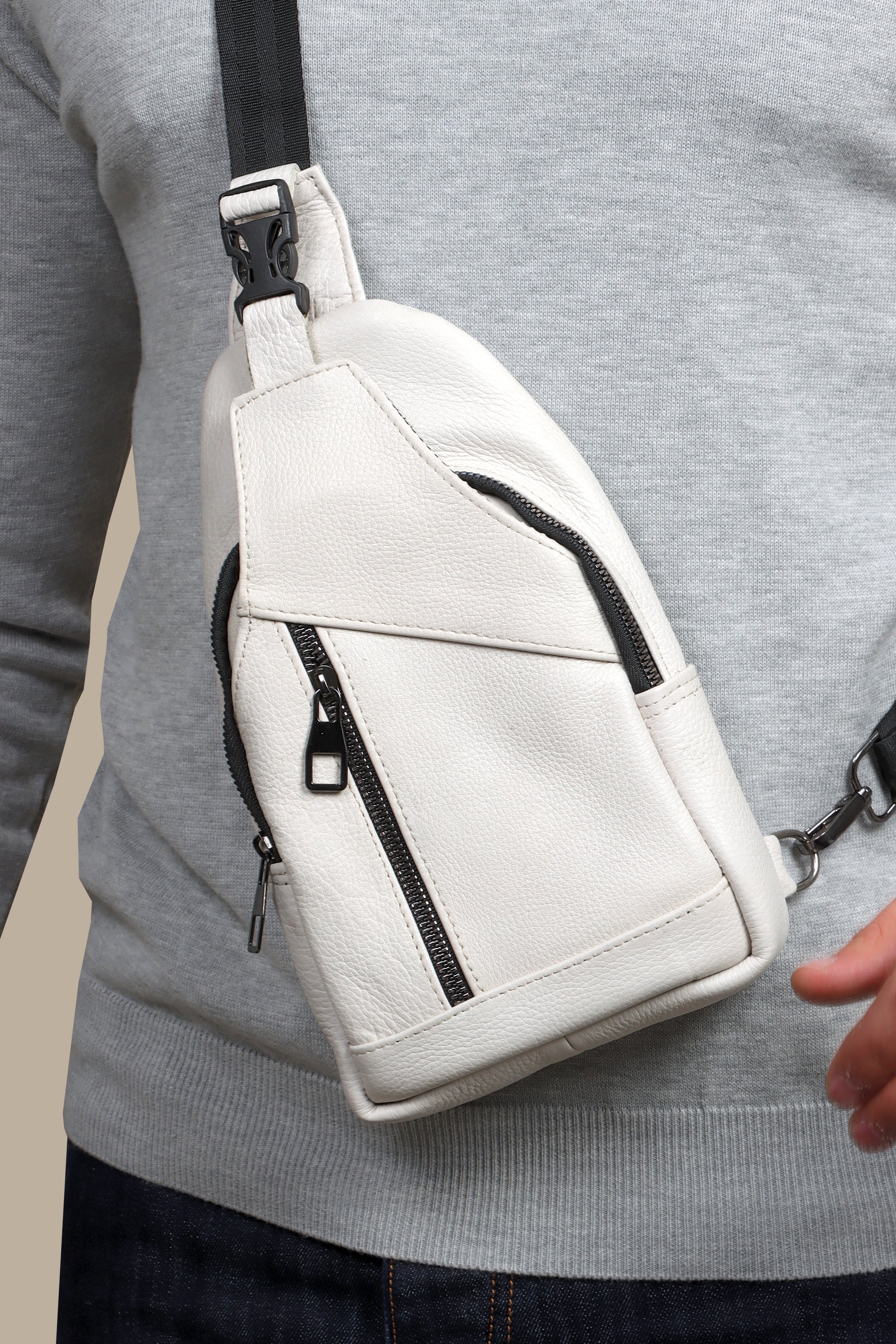 Timeless White Leather Crossbody Bag with Curved Elegance