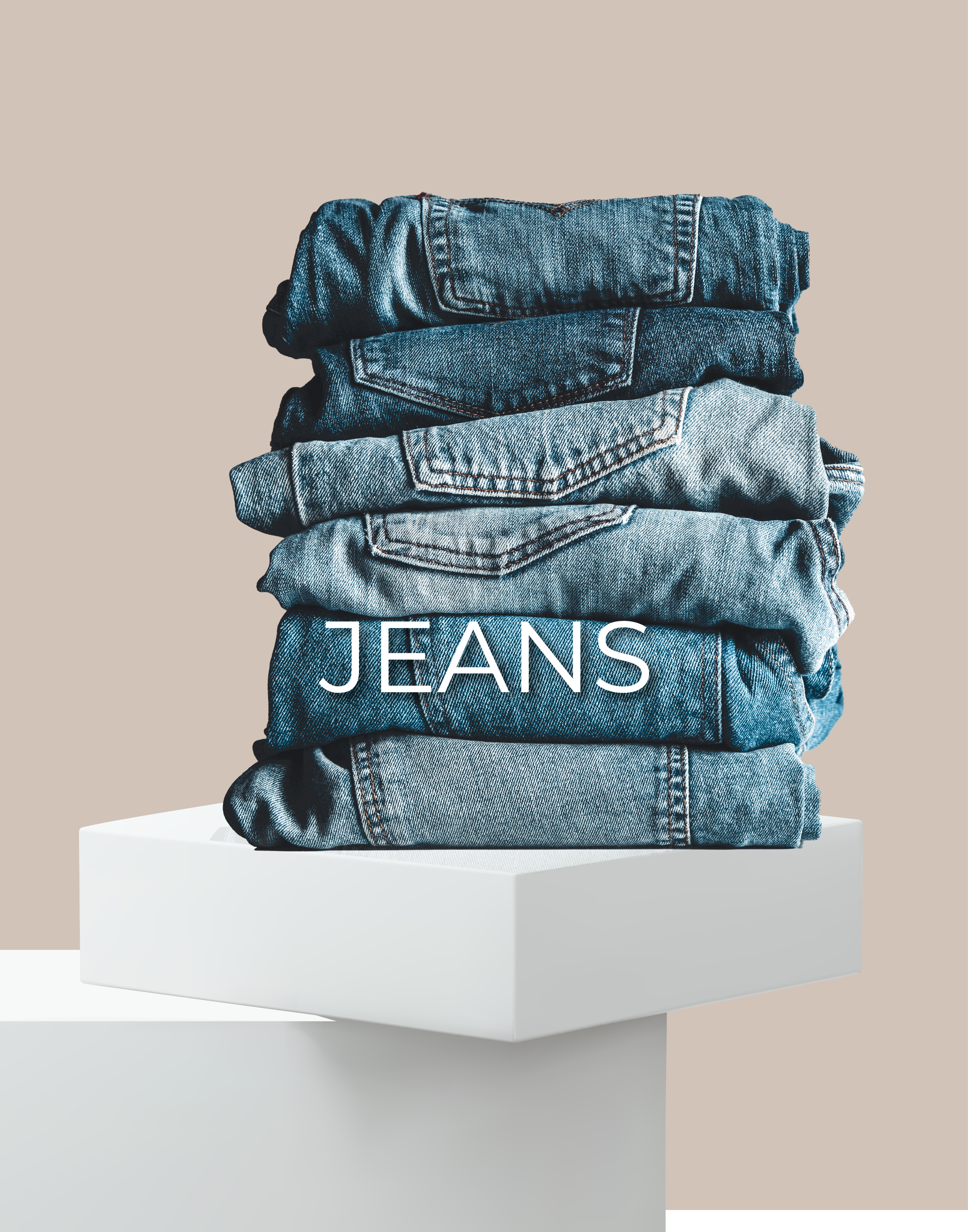 A stack of jeans and is written on the picture jeans